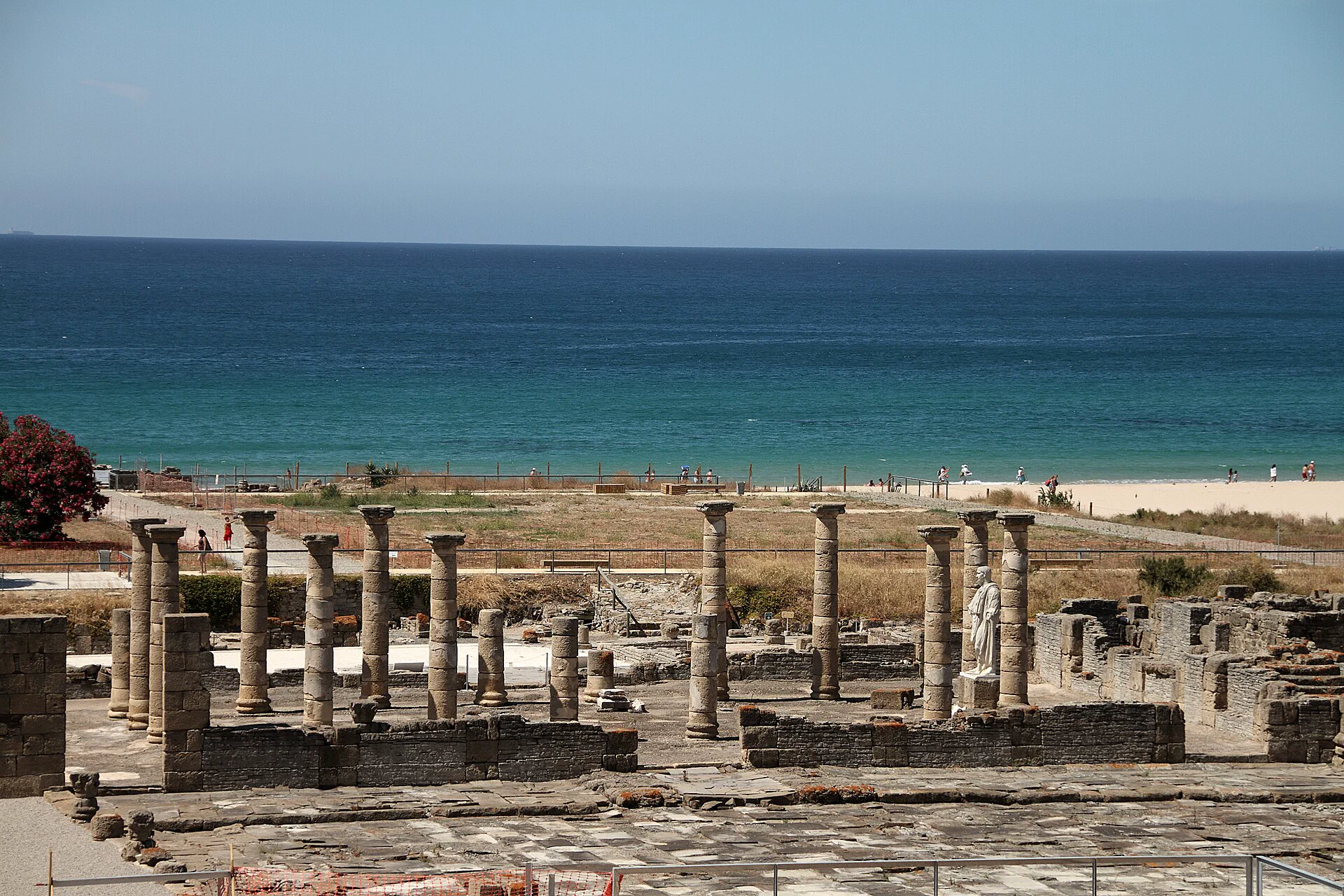 The Roman columns of Baelo Claudia standing above Bolonia beach