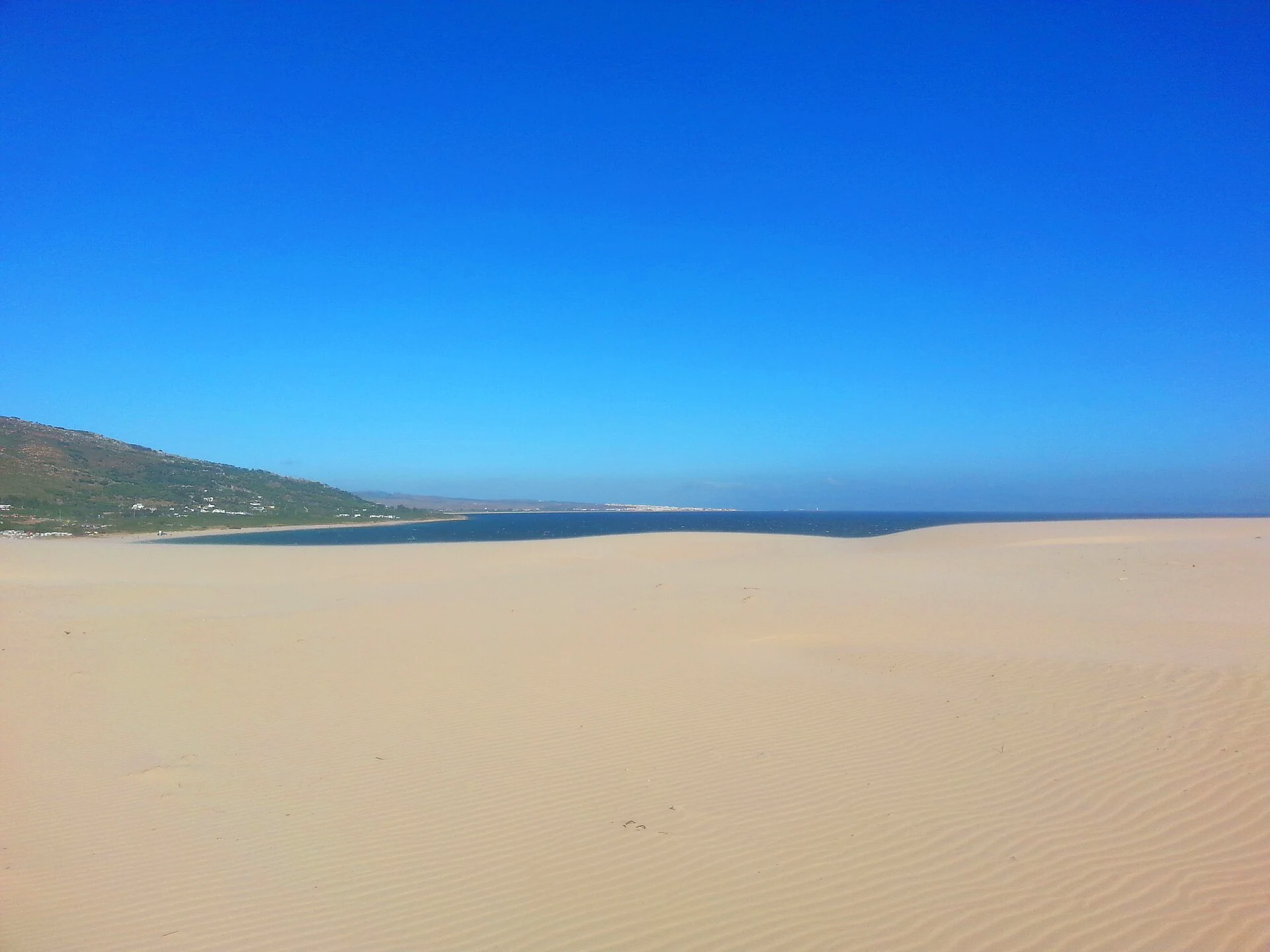 The big white dune above the bay at Punta Paloma