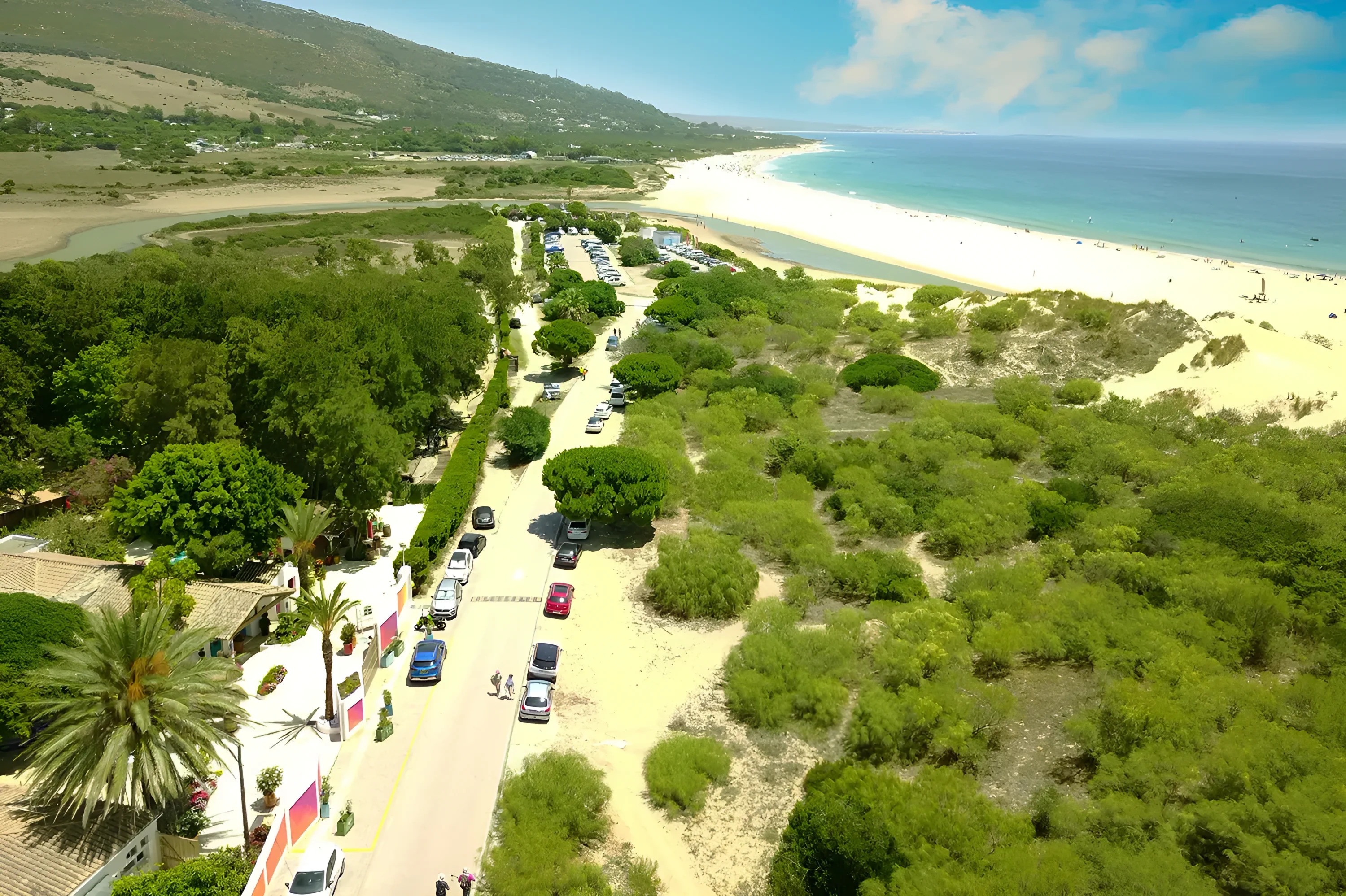 The resort gate, the track and the dunes running straight onto Valdevaqueros beach, from the air